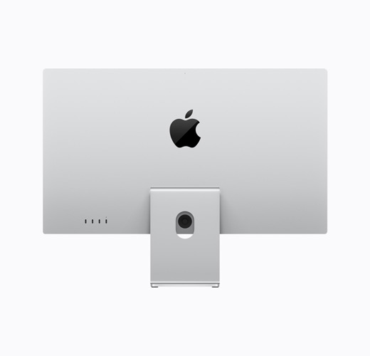 Apple Studio Display med fod med justerbar hældning, sølvfarvet, vist bagfra, skinnende sort Apple-logo i midten