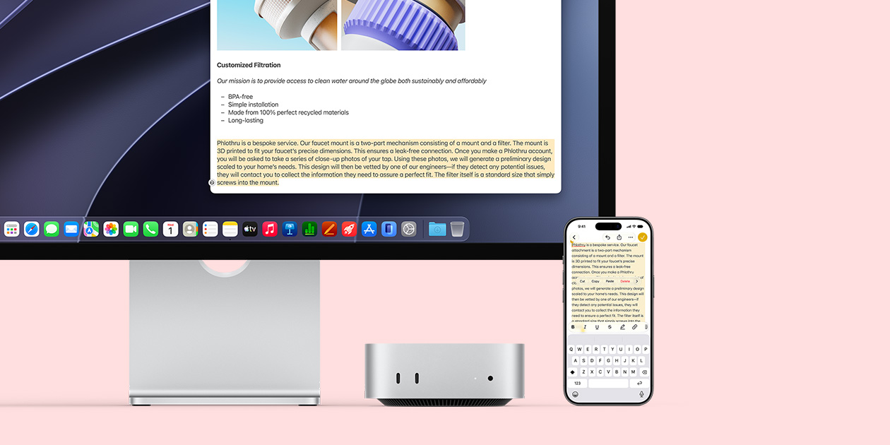 Mac&nbsp;mini front, tucked under Studio&nbsp;Display, an iPhone sits to the right of the device and the display, text selected with cut, copy, paste and AutoFill commands above on iPhone matches highlighted text on display, showcasing Universal Clipboard